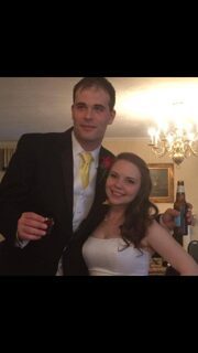 couple standing together at reception