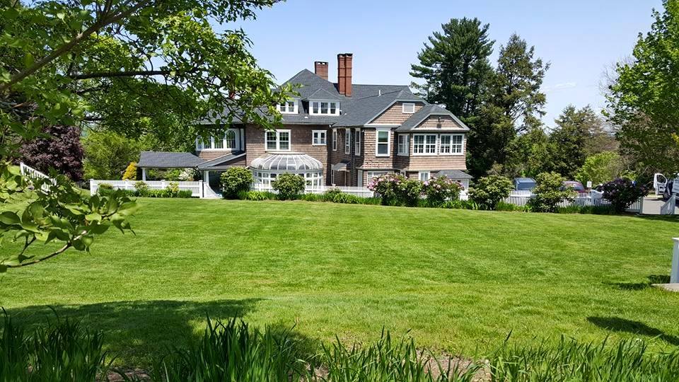 the back of the mansion across the conservatory lawn