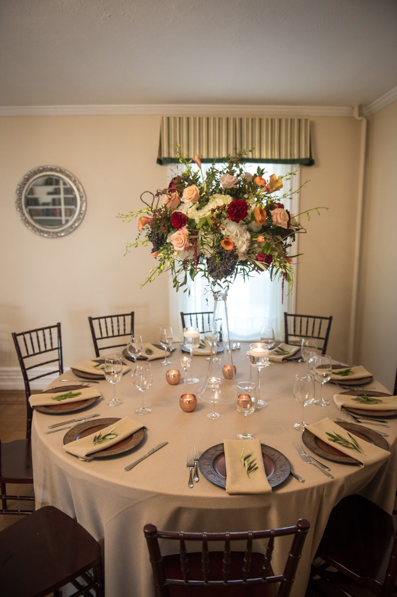 Light brown linen accented with chocolate charger plates