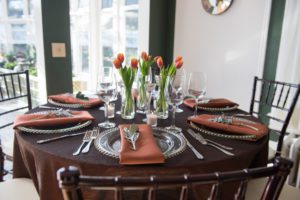 Shades of brown with spring tulips table setting