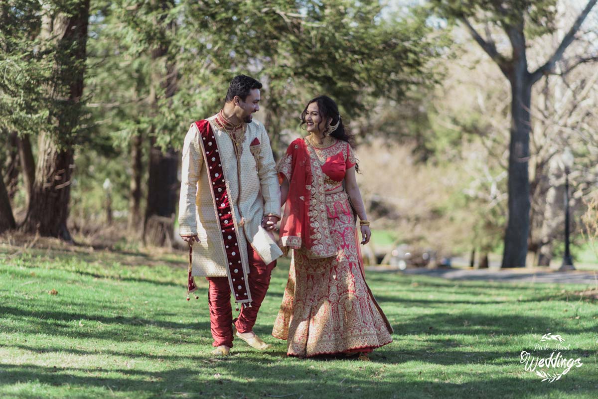 bride-groom-walking-dressed-in-traditional-indian-wedding-clothing